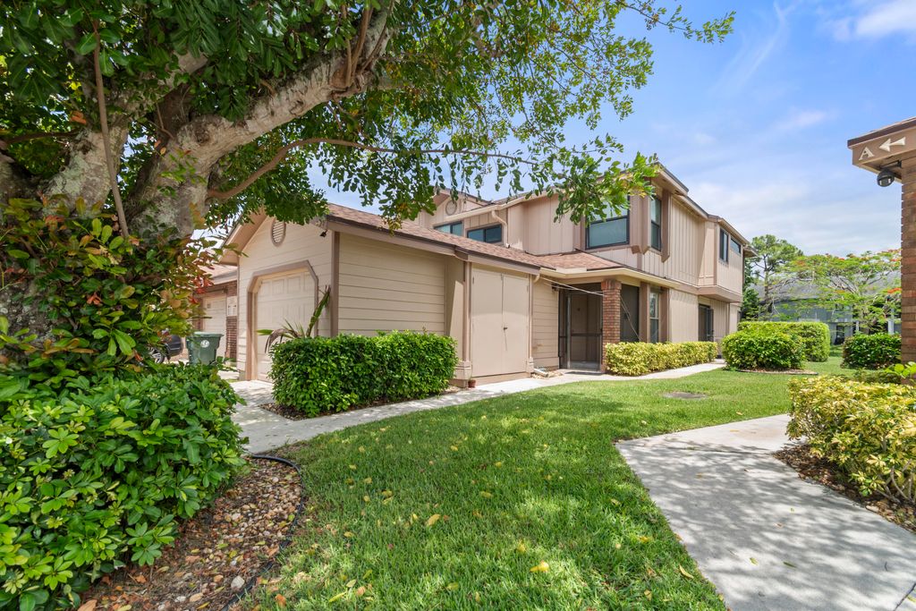 Photo of 500 Crosswinds Drive, Greenacres, FL 33413 (MLS # B26029241)