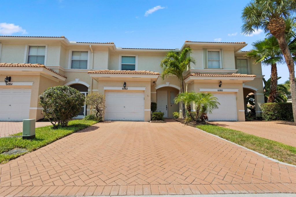 Photo of 6082 Seminole Gardens Circle, Riviera Beach, FL 33418 (MLS # R10889790)