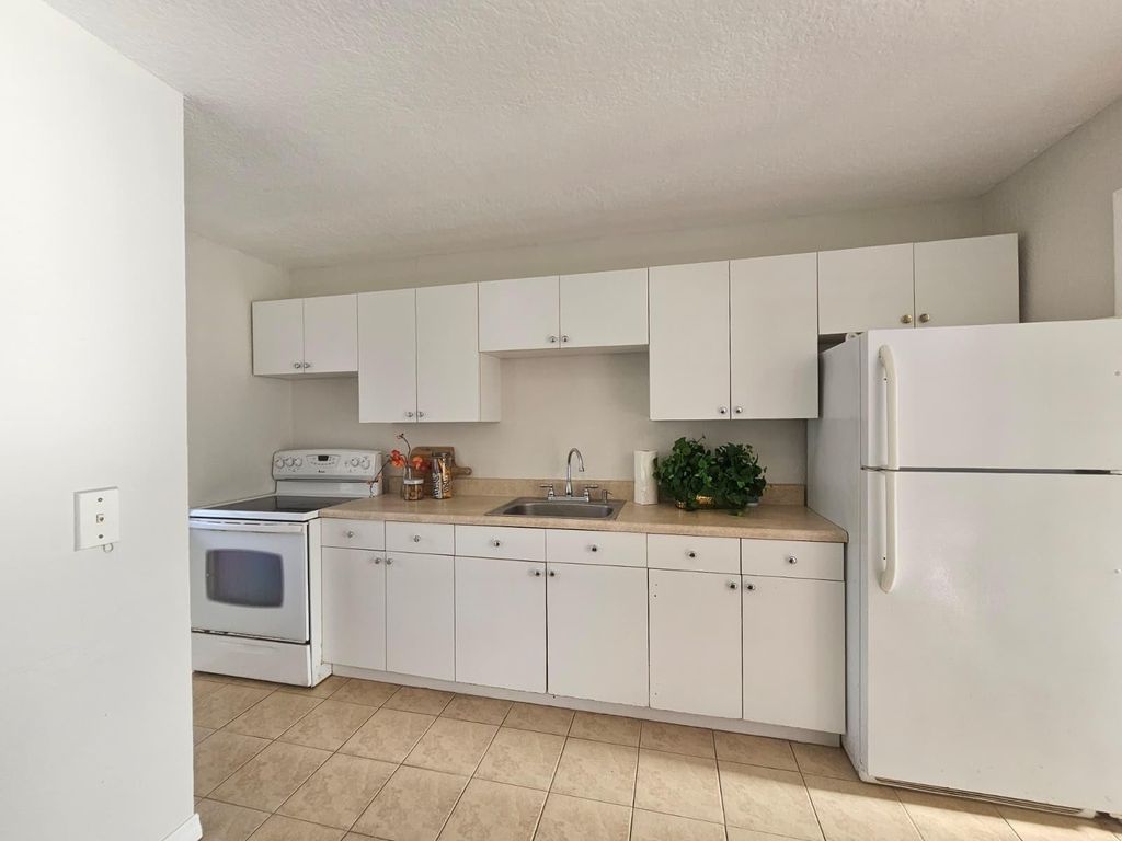 Photo of 1021 SE Monterey Road #A40, Stuart, FL 34994 (MLS # F10545588)