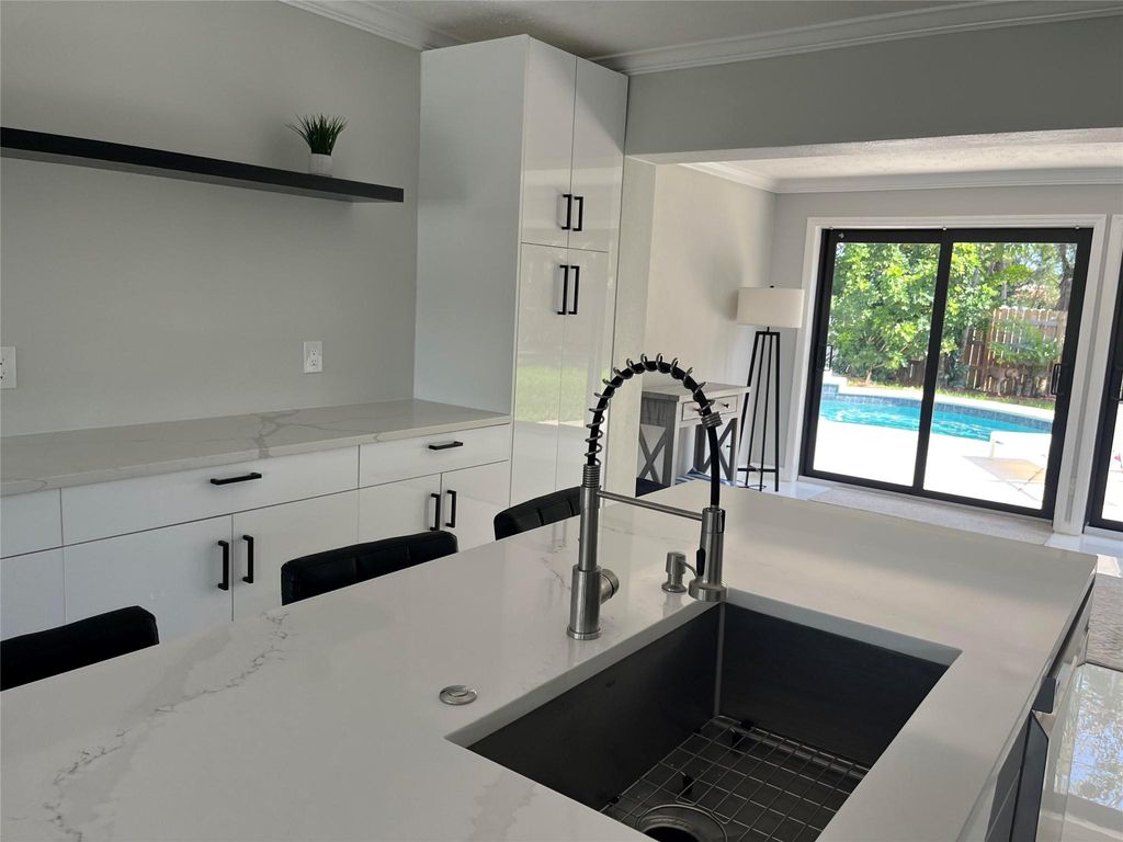 Photo of 1310 NE 42nd Street, Oakland Park, FL 33334 (MLS # F10486655)