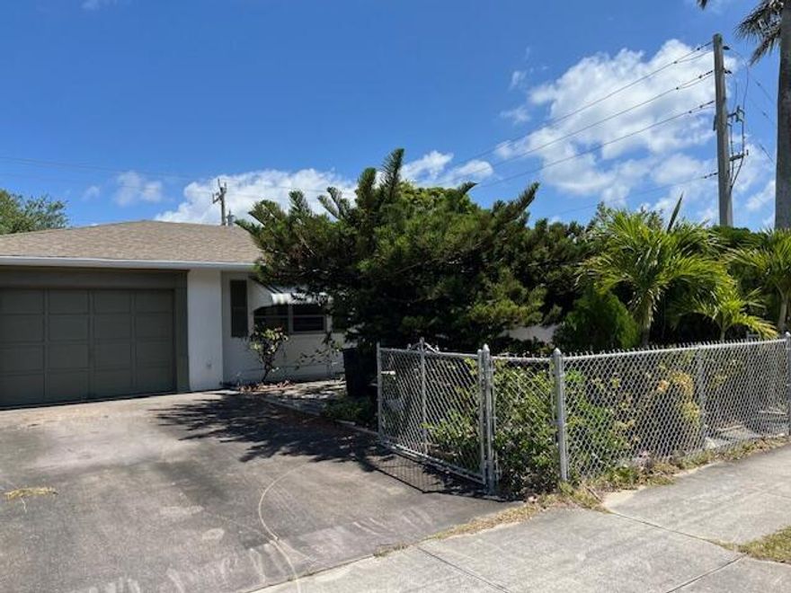 Discover this gem, first time on the market! This two-bedroom, two-bathroom CBS home nestled in the booming Lake Park area awaits your touch. TLC needed, but it's a blank canvas with endless potential. Features include a one-car garage, fully fenced yard for privacy, and a screened patio perfect for relaxation. Don't miss out on this opportunity to create your dream home in a prime location!