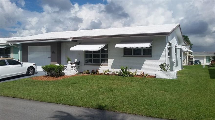 Pristine 2/1 with garage in lovely Tamarac neighborhood. Newer Trane A/C, and appliances. Family room and screened in back porch. This home has been well cared for inside and out. Low monthly maintenance includes complete lawn service, community clubhouse and pool. Close to new walking and exercise park. Near shopping and turnpike. Bathroom has sit down tub and shower. Pets welcome.  HOA states 55+ and minimum 700 credit score.