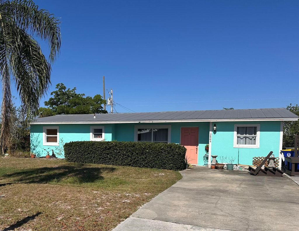 Photo of 2804 NE Hickory Ridge Avenue, Jensen Beach, FL 34957 (MLS # R11090606)