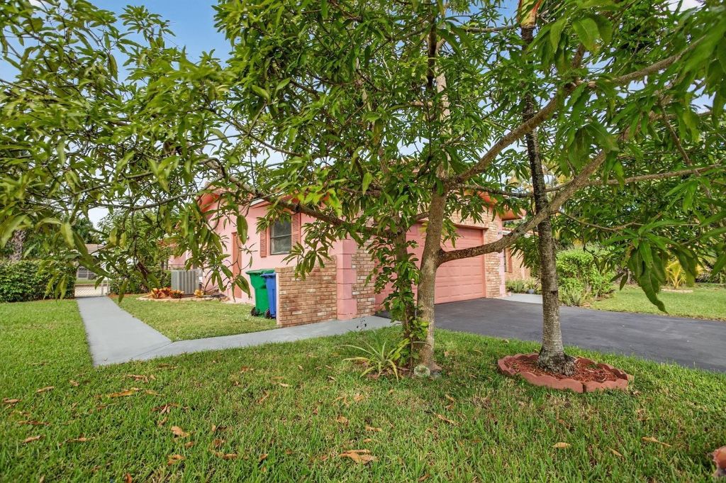 Photo of 4460 NW 105th Terrace, Coral Springs, FL 33065 (MLS # F10534986)