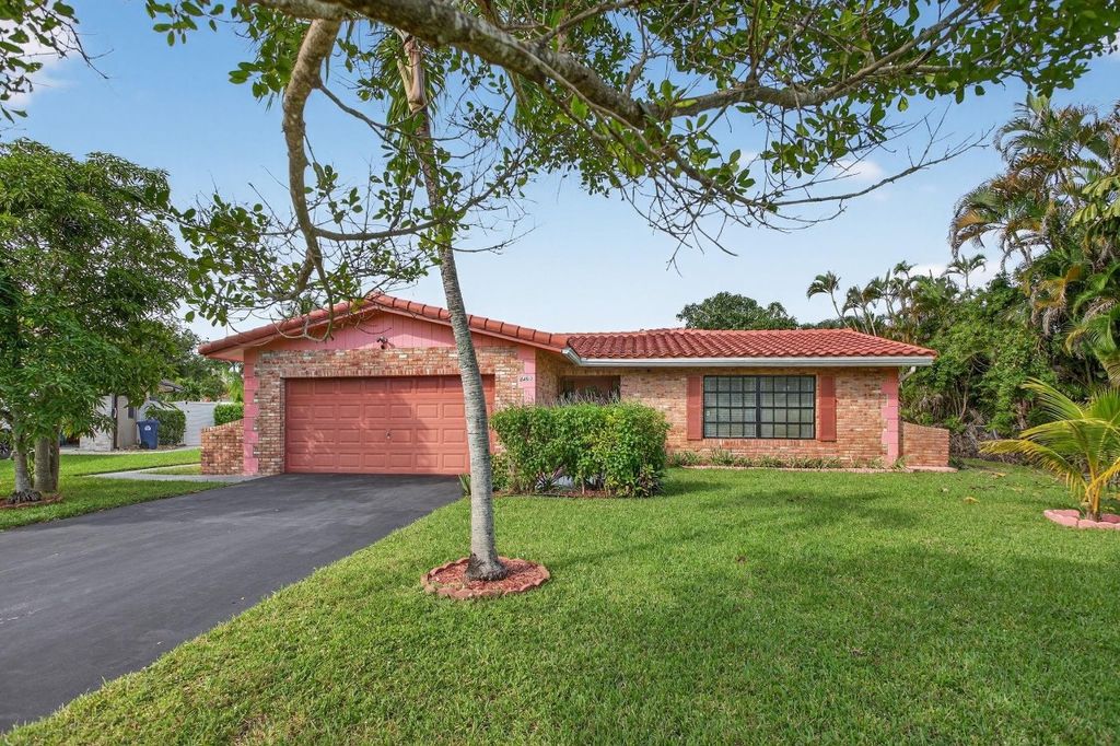 Photo of 4460 NW 105th Terrace, Coral Springs, FL 33065 (MLS # F10534986)