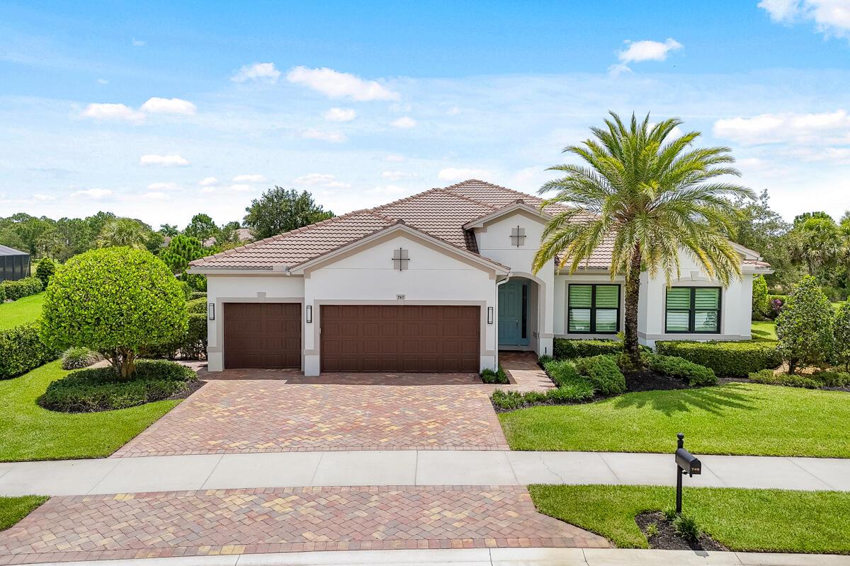 Elegance and thoughtful design come together in this exceptional residence located in the prestigious gated community of Copperleaf. Positioned on a beautifully landscaped 0.4-acre lakefront lot, this 4-bedroom, 3-bath Clubview model offers 3,089 square feet of sophisticated living space and a rare 3-car air-conditioned garage. The home's interiors are defined by timeless finishes and curated details: coffered ceilings, crown molding, wood accent walls, stone features, and plantation shutters. The expansive great room flows seamlessly into a gourmet kitchen outfitted with KitchenAid and LG appliances, custom cabinetry, a glass tile backsplash, and an oversized island ideal for gathering. Designed for elevated everyday living, the split-bedroom floor plan ensures privacy when needed, but