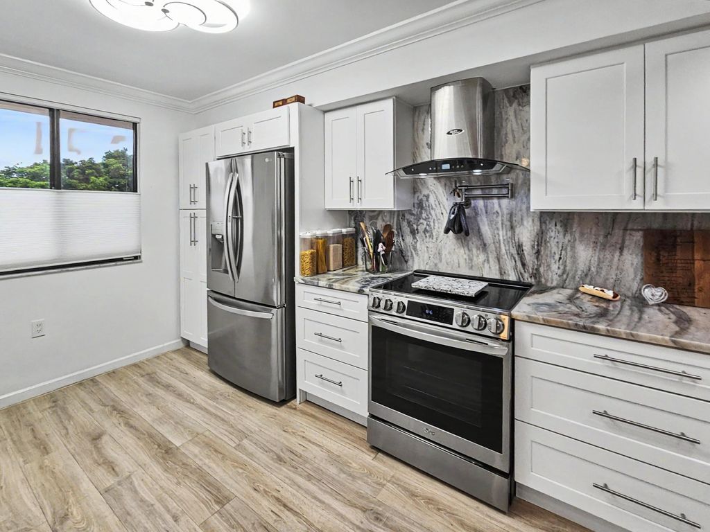 Photo of 2811 Village Boulevard #302, West Palm Beach, FL 33409 (MLS # B26056471)
