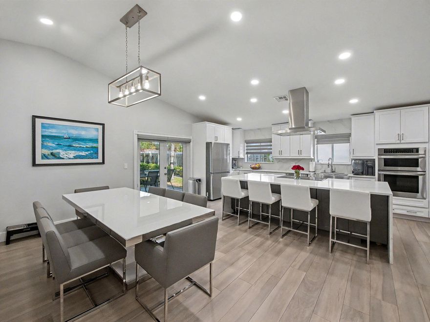 Welcome to 4073 NW 2nd Ave in beautiful Delray Beach -- a move-in ready home that blends modern upgrades with the South Florida lifestyle.

Step inside to a bright, open-concept kitchen designed for gathering, featuring updated cabinetry, newer appliances (2022), and seamless flow into the main living area. Brand-new flooring runs throughout the home, and the fully renovated bathrooms add a clean, contemporary touch. The split-bedroom layout offers privacy for the spacious primary suite while keeping guest rooms comfortably separated.

Major upgrades provide true peace of mind: a brand-new roof (2025), new water heater (2024), newer appliances (2022), and an A/C system that works perfectly. Everything has been thoughtfully improved so you can simply move in and enjoy. The backyard is oversized and full of potential -- with plenty of room to design your dream pool, outdoor kitchen, or tropical entertaining space.

Perfectly located just minutes to the beach, vibrant Atlantic Avenue in Downtown Delray, I-95, and the Florida Turnpike -- giving you quick access while still enjoying a quiet residential setting.

This is more than a home -- it's a lifestyle upgrade. A must-see.