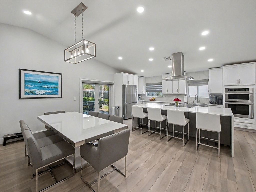 Photo of 4073 NW 2nd Lane, Delray Beach, FL 33445 (MLS # R11166336)