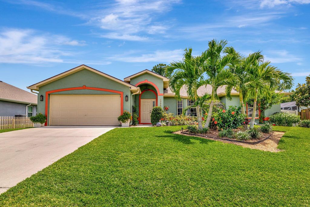 Photo of 6777 NW Abigail Avenue, Port Saint Lucie, FL 34983 (MLS # R11079437)