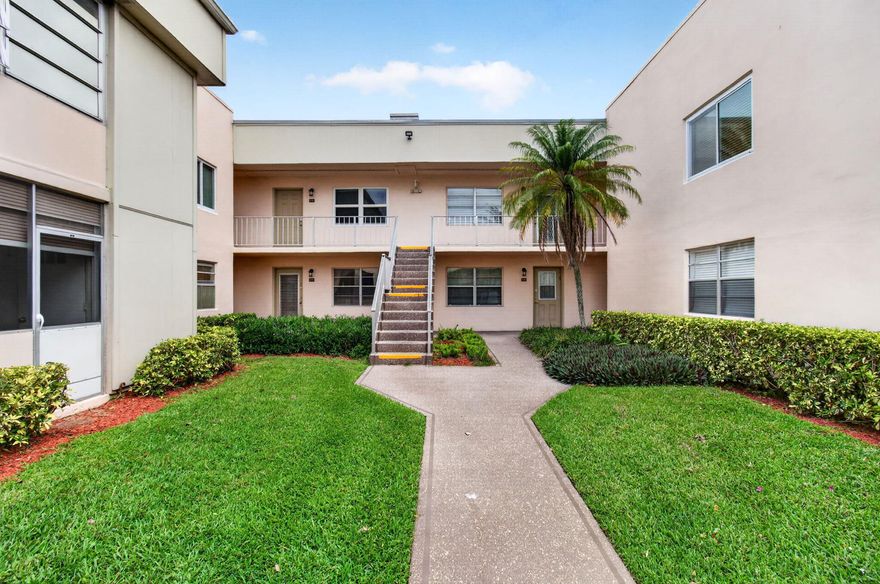 Beautiful ground-floor condo with tranquil lake and golf views in Kings Point Delray. This 2-bedroom, 2-bath home offers easy first-floor living with a bright, open layout and scenic water and fairway vistas. Well maintained with A/C (2016) and water heater (2016), and ready for your personal touch. Enjoy resort-style 55+ living in a gated community featuring golf, tennis, pickleball, multiple pools, clubhouse, fitness center, theater, café, and courtesy transportation. Conveniently located near shopping, dining, and just minutes to vibrant downtown Delray Beach and the ocean.