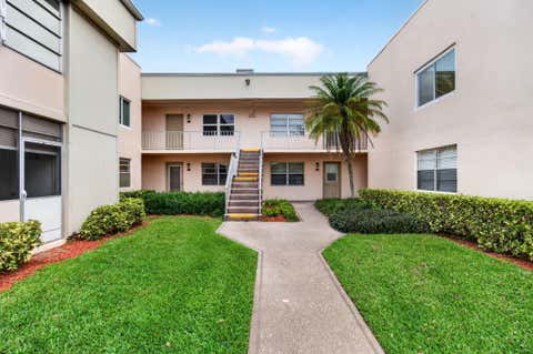 Photo of 349 Capri Dr #H, Delray Beach, FL 33484 (MLS # B26016170)