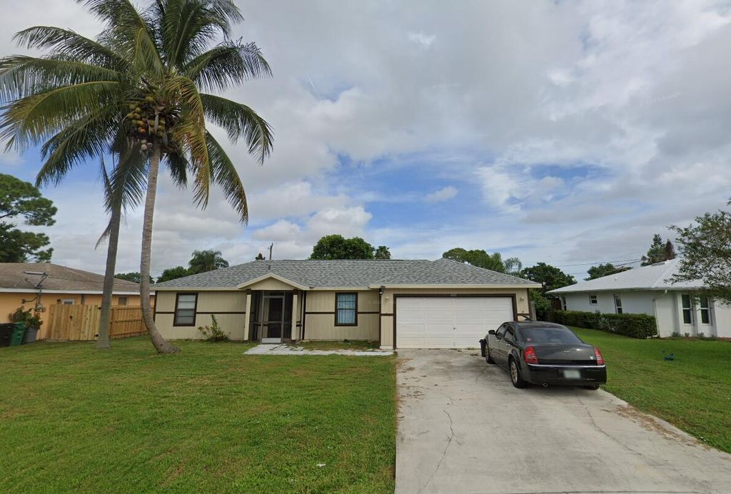 Photo of 2431 SE Victory Avenue, Port Saint Lucie, FL 34952 (MLS # R10939932)