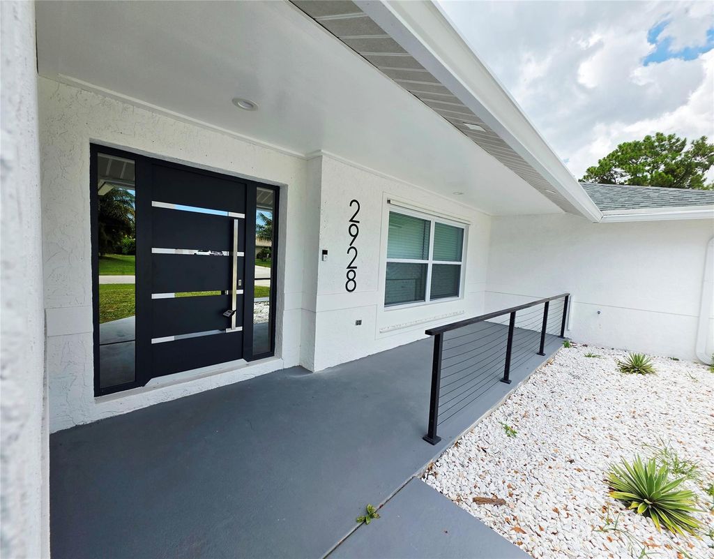 Photo of 2928 SE Bella Road, Port Saint Lucie, FL 34984 (MLS # B26011434)
