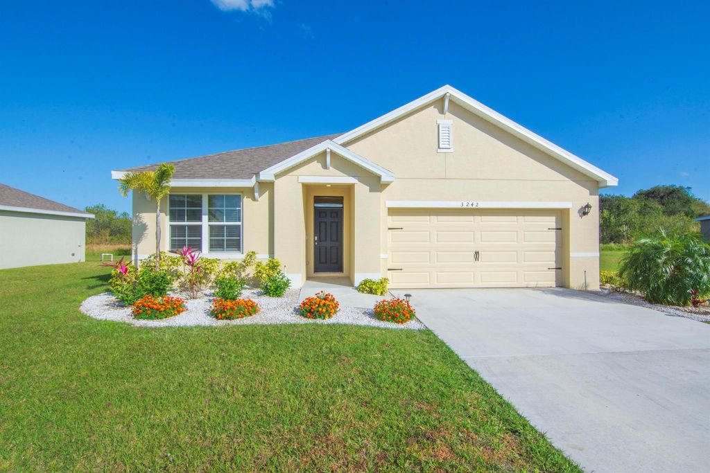 Photo of 3242 Trinity Circle, Fort Pierce, FL 34945 (MLS # R10963257)