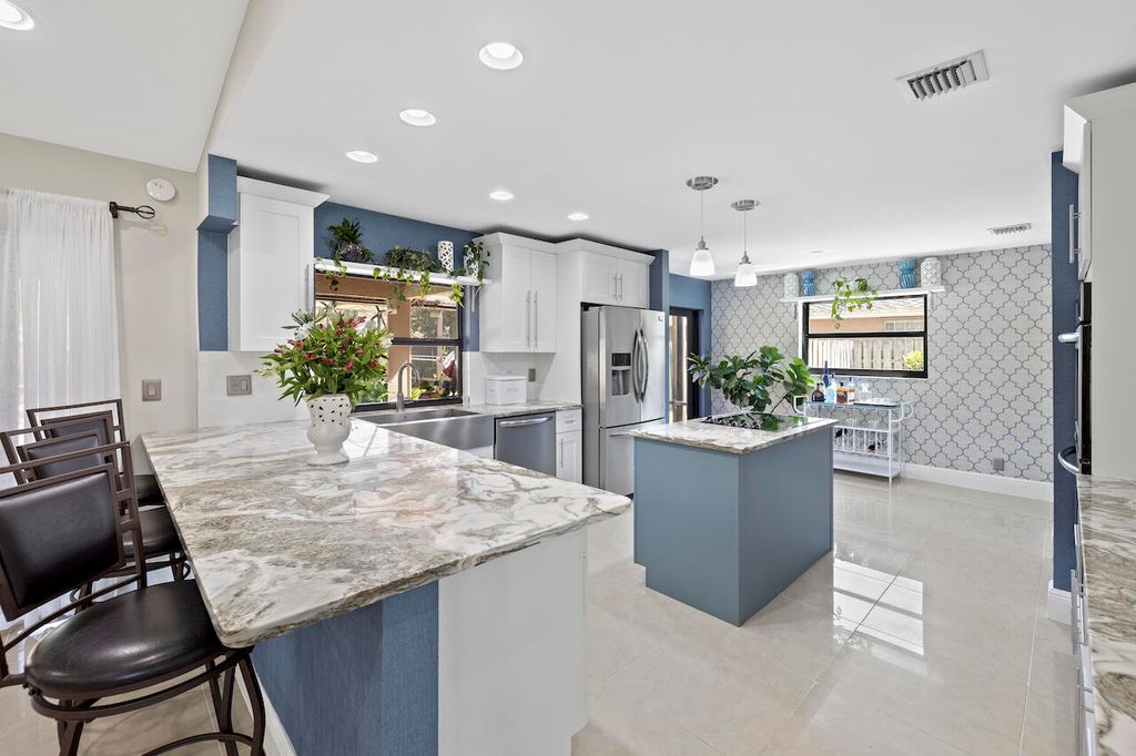 Photo of 14229 Stirrup Lane, Wellington, FL 33414 (MLS # R10970271)