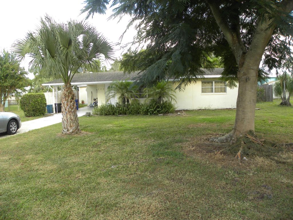 Photo of 3121 NE Spruce Ridge Avenue, Jensen Beach, FL 34957 (MLS # R10932695)