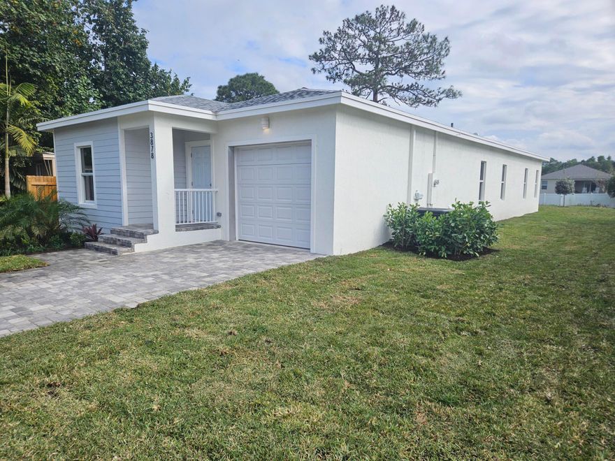New Construction! 3 bed, 2 baths & garage. A WOPPING 1757 sqft. DONT LET THE ''COZY COTTAGE APPEARANCE FOOL YOU! THIS HOME HAS TON'S OF SPACE! Upgrades Galore! Features 10'ceilings, 2'X4'' Porcelain Tile. Quality ALL WOOD Semi Custom Cabinetry/Quartz Counters throughout. Primary Features Walk in Closet & ensuite Bath w/Dual sinks. Solid Core Interior Doors, Upgraded 6'' Baseboard/4'' Casing, Closet Built in Organizers. Quality GE SS Kitchen Appliances, Upgraded Impact windows & doors. Laundry/Util Room. Upgraded Plumbing/Electrical fixtures/Ceiling Fans. Split Bedroom Design w/ large Open Great Room Incl Seating For 4 at Counter & Access to Covered Patio. Exterior Features Paver Driveway/Patio. Automated Irrigation & Large Rear Yard. Conveniently Located to Waterfront, Dining, parks & More