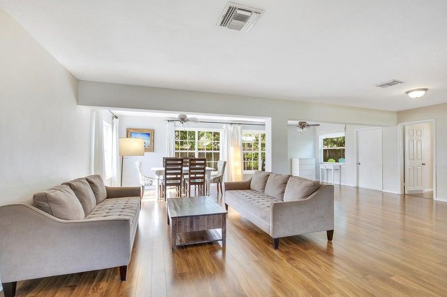 WALKABILITY, EAST BOCA!!! NEW PRICE, NEW SS KITCHEN APPLIANCES on 6/30 see photos- PRICED TO SELL WON'T LAST! Enjoy this open concept home with a split bedroom floorplan. Home has great curb appeal with a newly pavered driveway with custom walkway & landscaping to front door. The private fenced backyard is large enough for a pool, has a firepit, patio, 2 mature mango trees & bananas. Flooring was replaced with wood laminate throughout, tile in bathrooms, no carpet. 2nd bathroom was remodeled. Windows have been replaced by previous owner approx 4-5 yrs ago. Excellent East Boca location in desirable Chatham Hills just off Federal hwy, south of Spanish River. Close to Mizner(2mi), FAU(1.8mi) & downtown Delray. Walk to the beach (1.2mi), shopping, restaurants with no HOA & top rated schools. Call today, this one will go fast. All Info contained herein not warrantied and to be verified by buyer