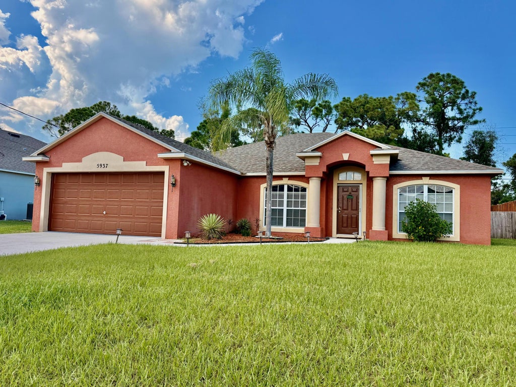 Photo of 5937 NW BAYNARD Drive, Port Saint Lucie, FL 34986 (MLS # B26060965)