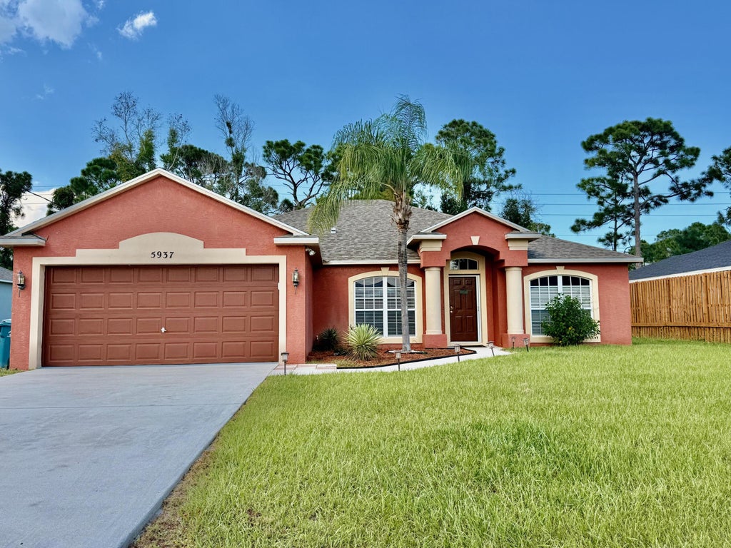 Photo of 5937 NW BAYNARD Drive, Port Saint Lucie, FL 34986 (MLS # B26060965)