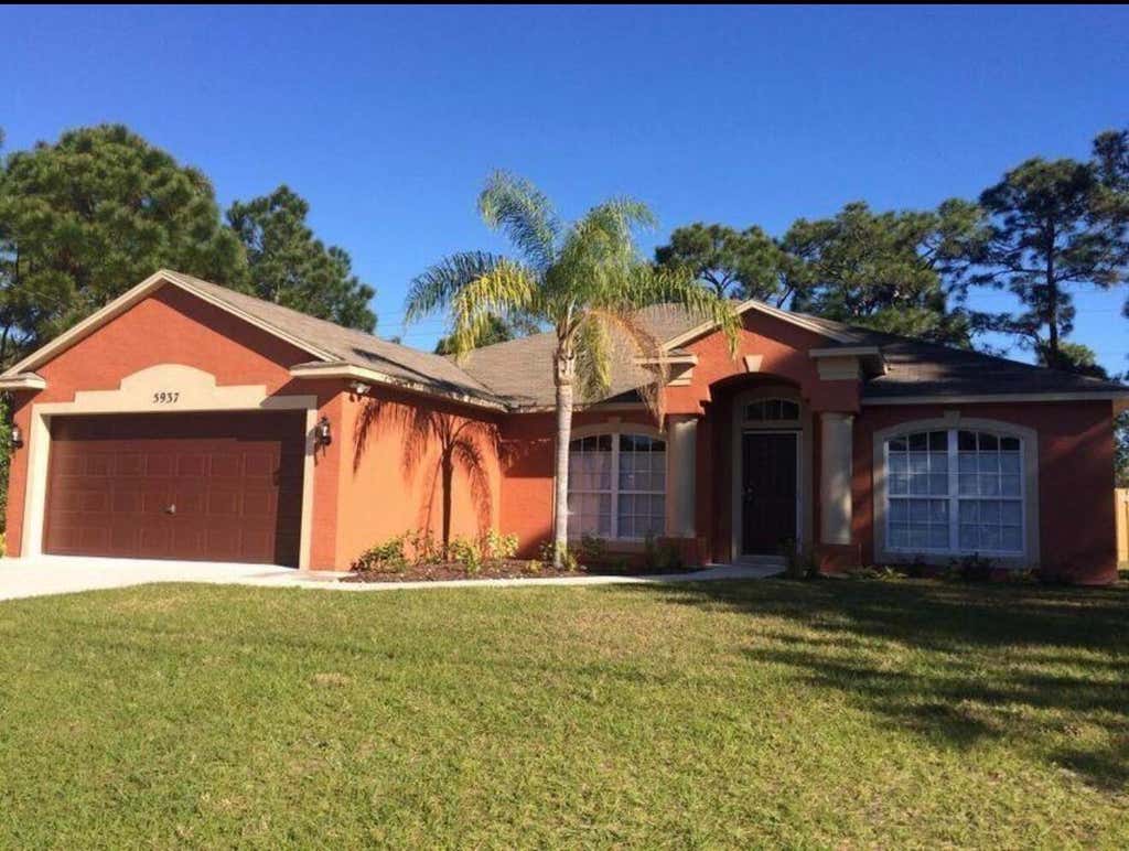 Photo of 5937 NW BAYNARD Drive, Port Saint Lucie, FL 34986 (MLS # B26060965)