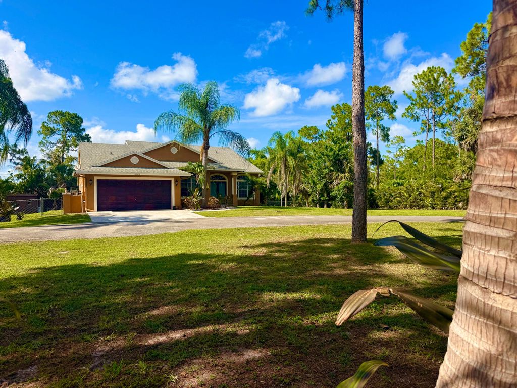 Photo of 14703 N 71st Pl Place N, The Acreage, FL 33470 (MLS # B26039625)