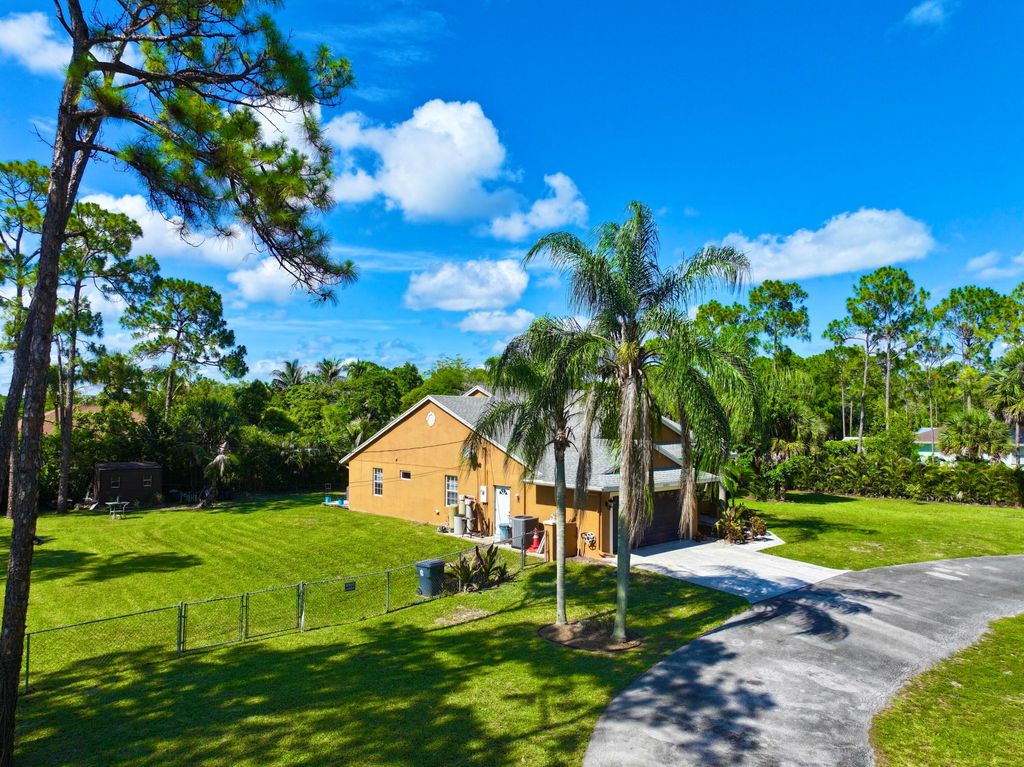 Photo of 14703 N 71st Pl Place N, The Acreage, FL 33470 (MLS # B26039625)
