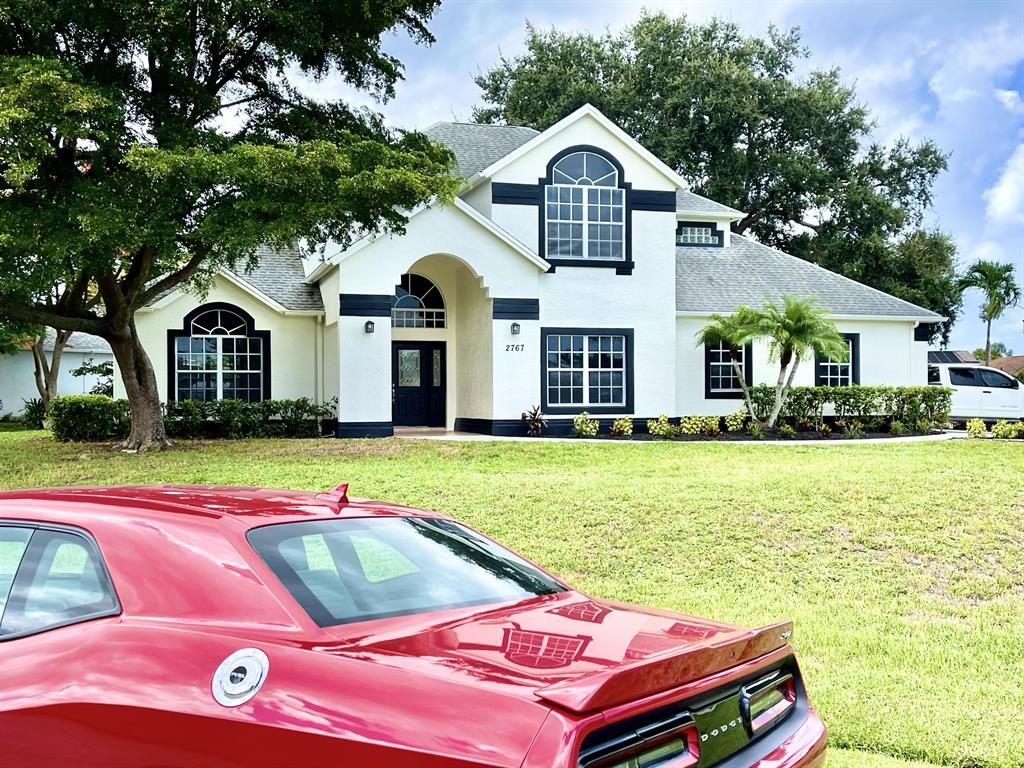 Photo of 2767 SW District Avenue Ave, Port Saint Lucie, FL 34953 (MLS # R10828632)