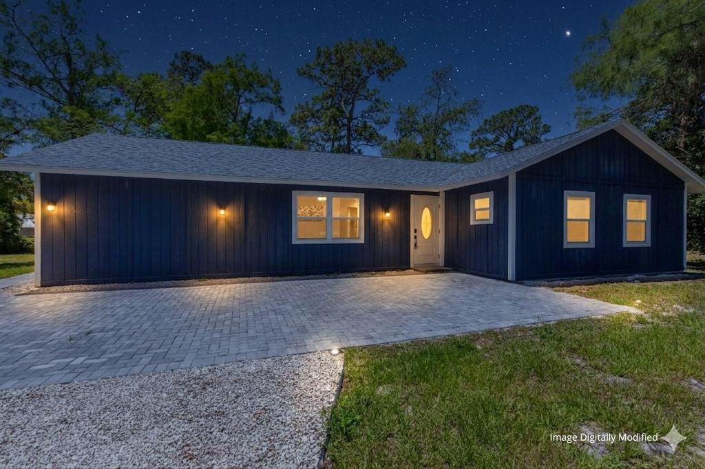 Photo of 16932 W Aintree Drive W, Loxahatchee, FL 33470 (MLS # B26019012)