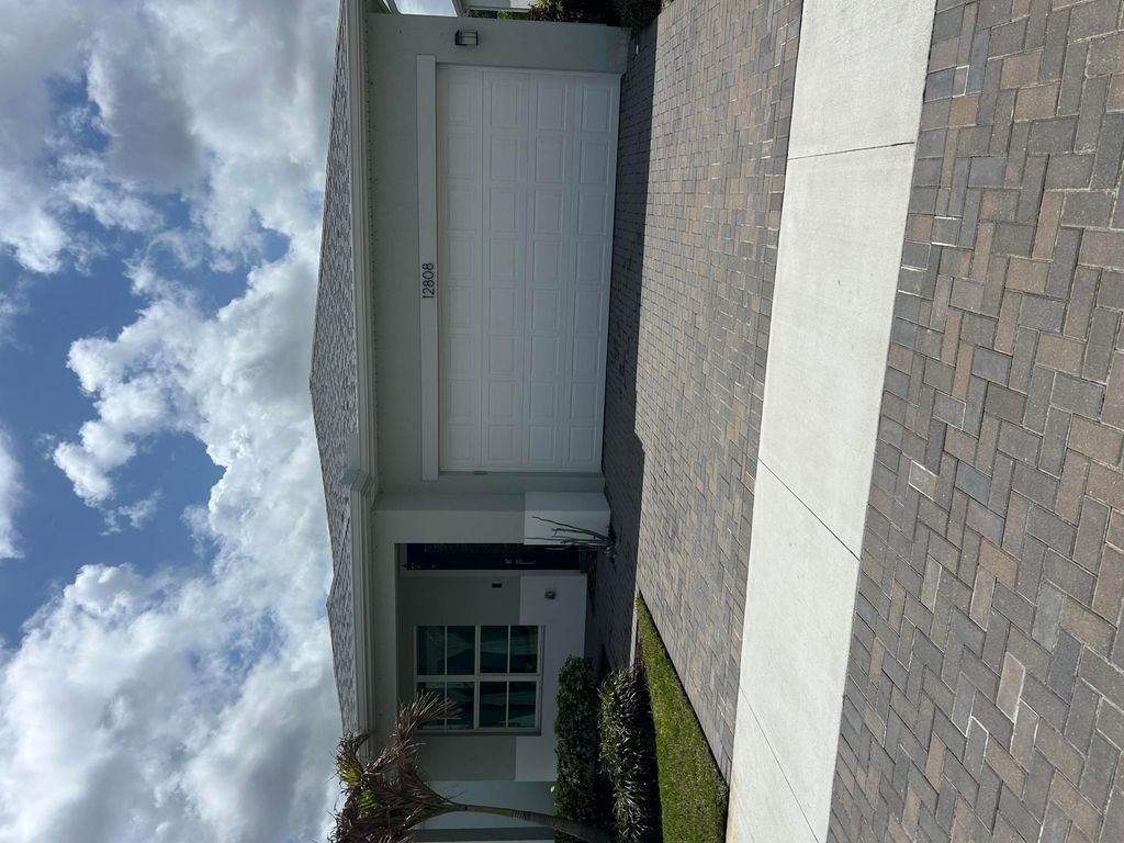 Photo of 12808 SW Eleanor Drive, Port Saint Lucie, FL 34987 (MLS # B26010846)