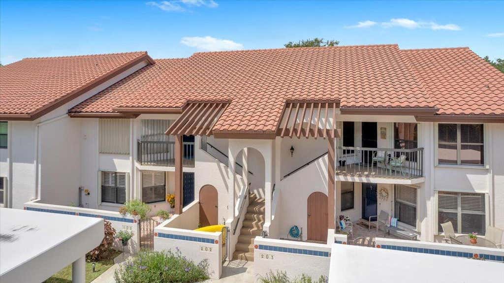 Photo of 6050 SE Martinique Drive #102, Stuart, FL 34997 (MLS # B26063533)