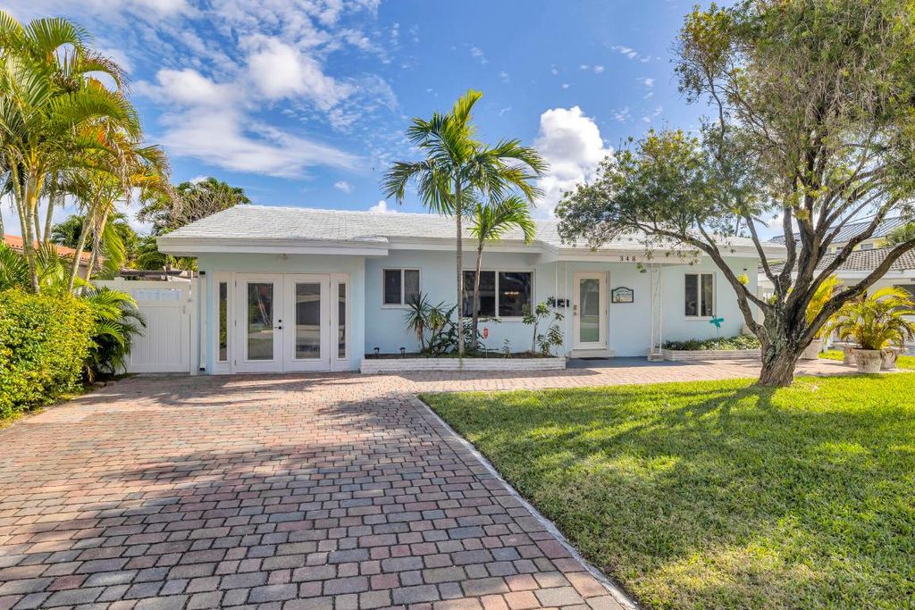 Photo of 348 SE 18th Avenue, Deerfield Beach, FL 33441 (MLS # R11088450)