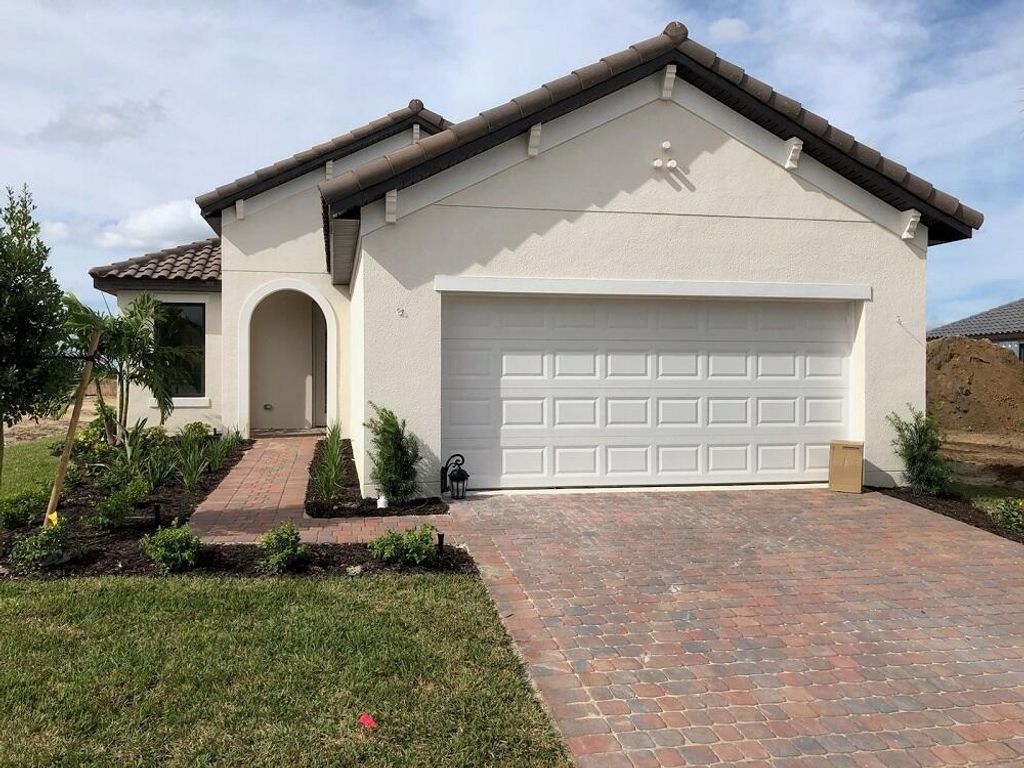 Photo of 12765 SW Ambra Street, Port Saint Lucie, FL 34987 (MLS # R10739080)