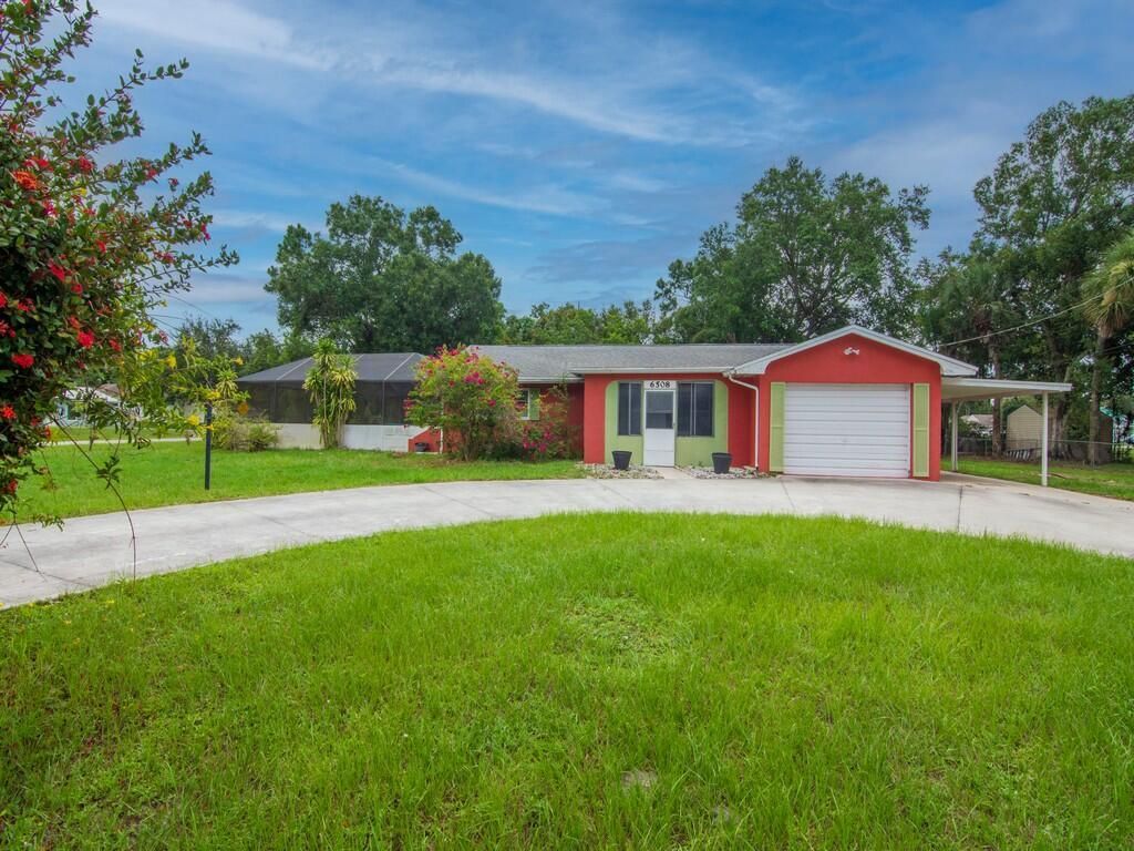Photo of 6508 Woodsmere Way, Fort Pierce, FL 34951 (MLS # R10900440)