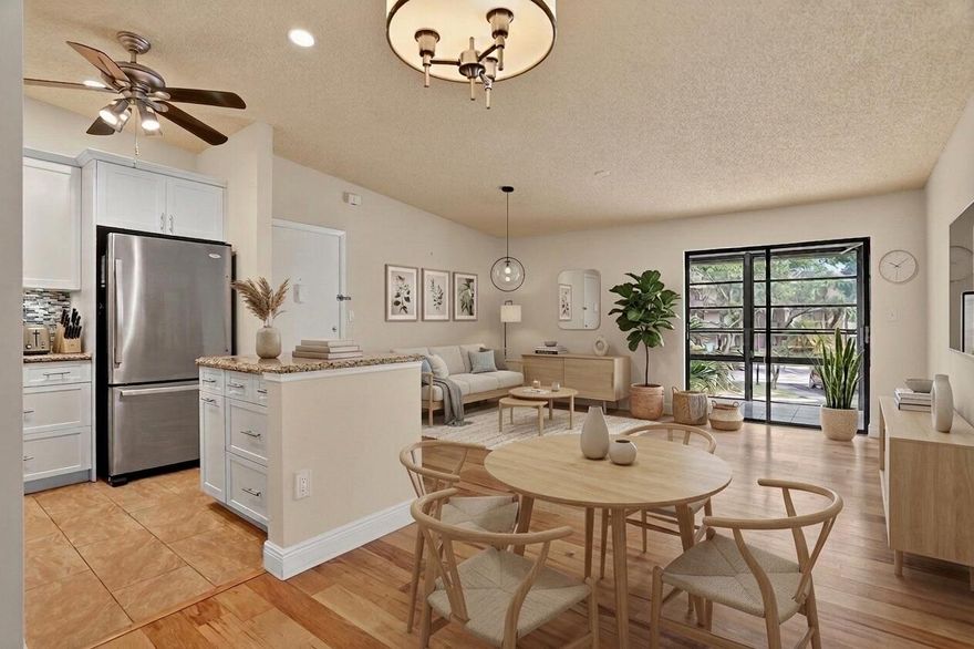 Welcome to Ashmont, within the amazing Kings Point Community. This beautifully renovated, corner unit is located on the 2nd floor. The tastefully designed open kitchen features stainless steel appliances, and a double oven perfect for any at home chef. View the pool from your spacious master suite with a large walk in closet and brand new flooring. New Water Heater(2025), AC (2020), Roof (2020). Washer/Dryer with plenty of storage space located on the expansive patio. Located just steps away from the community pool. HOA includes Water, Trash, Internet and Cable w/ HBO & Showtime. Kings Point Tamarac is a homeowner's dream come true. This active community is complete with state-of-the-art performing arts theater, cinema, fitness center, tennis & pickle ball, indoor/outdoor pools & spa, Billiards room, arts & crafts, air conditioned shuttle buses, and endless clubs and social events. A vibrant, resort-style community designed for active, fun-loving adults!