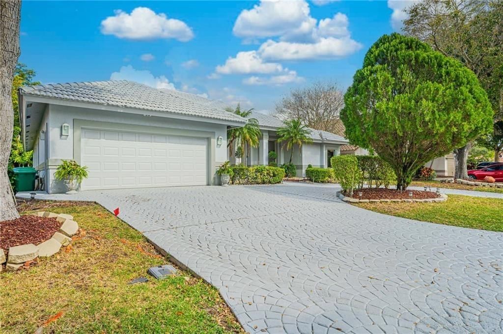 Photo of 12499 Classic Dr, Coral Springs, FL 33071 (MLS # F10539468)