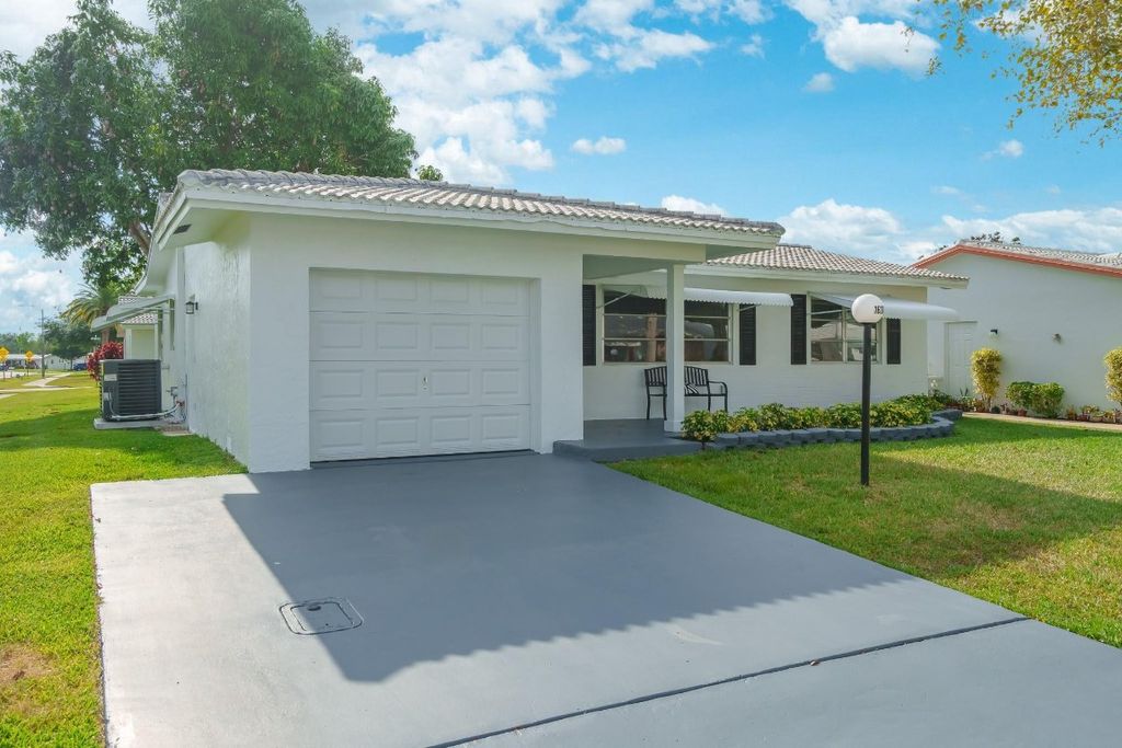 Photo of 1620 NW 87th Terrace, Plantation, FL 33322 (MLS # F10548526)