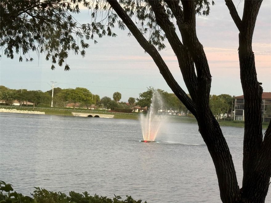 LAKE VIEW! 2 beds 2 baths, 2nd largest model in the newest section of Century Village. Spacious unit with galley kitchen, two walk-in closets, an in-unit washer and dryer, and a screened patio overlooking the lake. Enjoy the convenience of a ground-floor location with your assigned parking space directly across from the unit. Water, basic cable, and internet are included. Century Village is a sought-after 55+ HOPA community offering resort-style living with a million-dollar clubhouse, two fitness centers, 24-hour security, and swimming pools. Amenities include tennis, golf, theater and live shows, movies, billiards,  places of worship, bus transportation, and a wide variety of classes, clubs, and activities. Enjoy the active lifestyle Century Village has to offer! Min. credit score 650