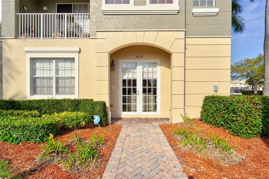 Beautifully maintained and updated 3 bedroom, 2 bath, first floor corner unit with attached garage and driveway. Featuring Brand New: washer & dryer, refrigerator, electrical box, smoke alarms, garage door, new tile flooring in master suite, updated kitchen lighting, entire unit just  painted. Also, newer air conditioner and newer large hot water tank. Great location in complex, steps away from the pool, exercise and community rooms.  Walking distance to many shops, restaurants, and grocery stores. No Assessments - Unit has it all.  Can be sold furnished or unfurnished.