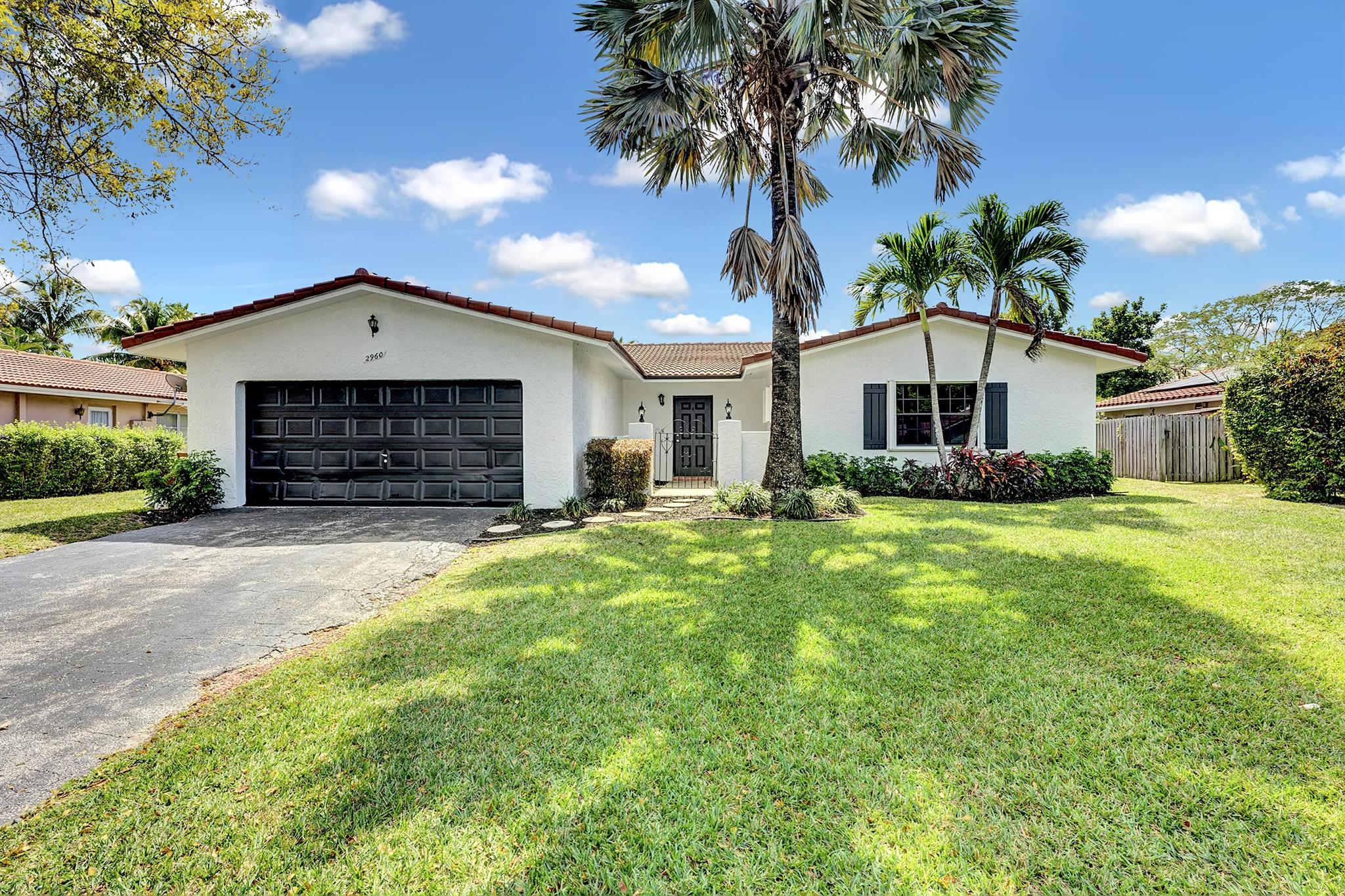 Discover your dream home, newly remodeled and waiting for you. This exquisite 4-bedroom, 2-bathroom residence, complete with a dedicated office, combines luxury and comfort. Enjoy the elegance of quartz countertops, luxury vinyl flooring, and stainless steel appliances. Enhanced with hurricane impact windows, stunning bathrooms, and a new roof, every detail caters to a seamless lifestyle. The natural canal offers breathtaking sunset views, perfect for gatherings. Situated in a top-rated school district, it's the ultimate living space. Experience it firsthand--book your tour today. New fence just added!