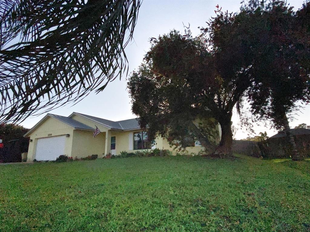 Photo of 1156 SW Ivanhoe Street St, Port St Lucie, FL 34983 (MLS # R10697860)