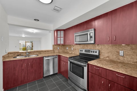 Photo of 2164 CHAMPIONS Way, North Lauderdale, FL 33068 (MLS # B26082251)