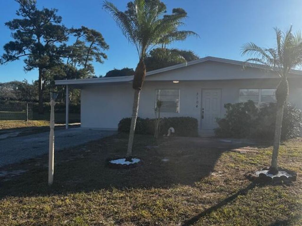 Photo of 3104 Evergreen Ln, Palm Springs, FL 33461 (MLS # R11160156)