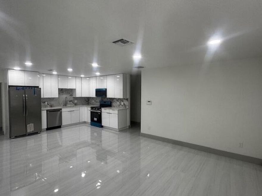 welcome to your new home in the heart of west palm beachs ! This spectacular remodeled house combines modern design ,comfort and efficiency . Whit high quality finishes and a spacious distribution ,it is the perfect option for those looking to move without the need for additional renovation FEATURED FEATURED Completely remodeled ready to live in moder kitchen with new cabinets and ceramic backsplash new tile floors thoughout the house updated bathrooms with elegant finishes skylights greater safety and naturallight new roof and recent air conditioning for great efficiency large backyard ideal for meetings or future extensions great 
conections for an  ARB