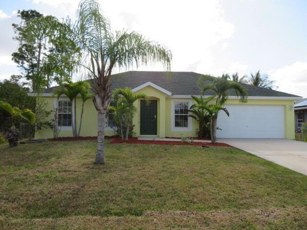 Photo of 3067 SW Lucerne Street, Port Saint Lucie, FL 34953 (MLS # R10794651)