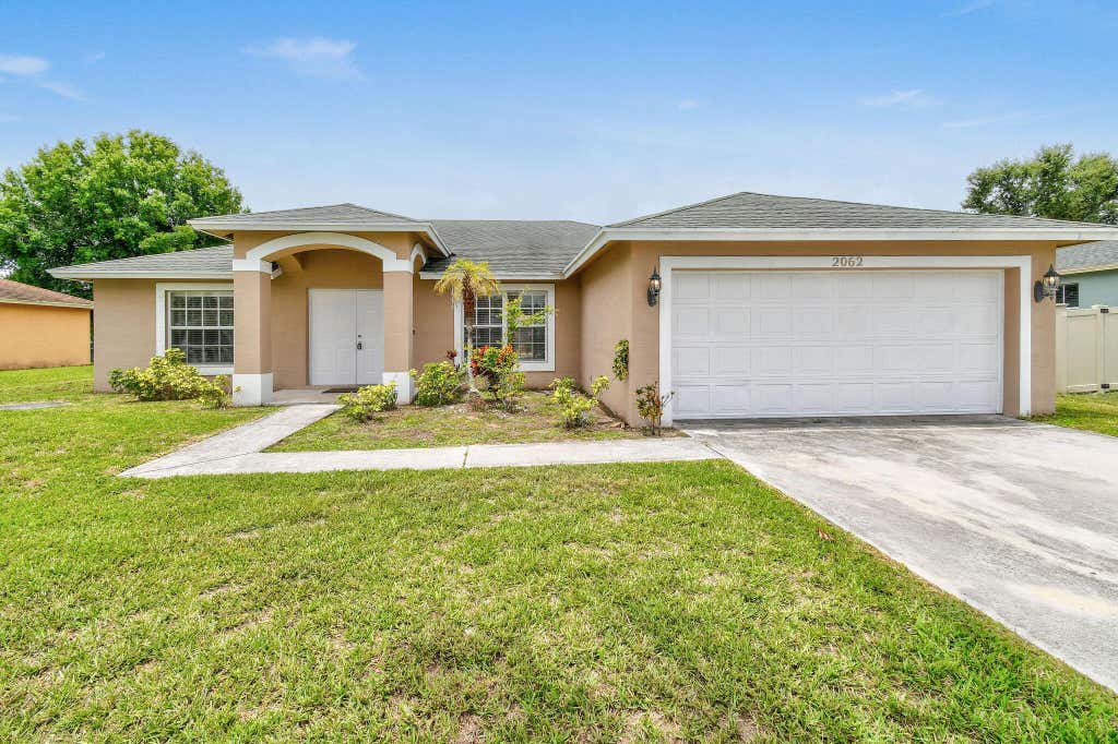 Photo of 2062 SW Greenan Lane, Port Saint Lucie, FL 34953 (MLS # R11003621)