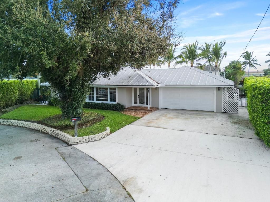 Photo of 1410 Arabian Road E, Lake Clarke Shores, FL 33406 (MLS # R11155257)