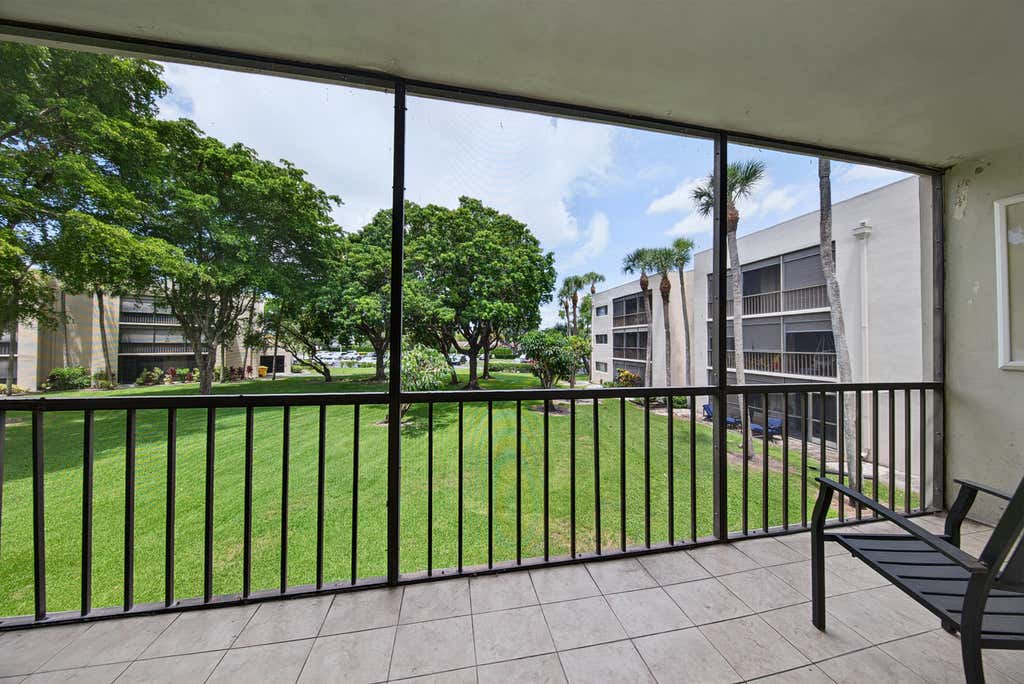Photo of 5190 LAS VERDES Circle #214, Delray Beach, FL 33484 (MLS # B26060072)