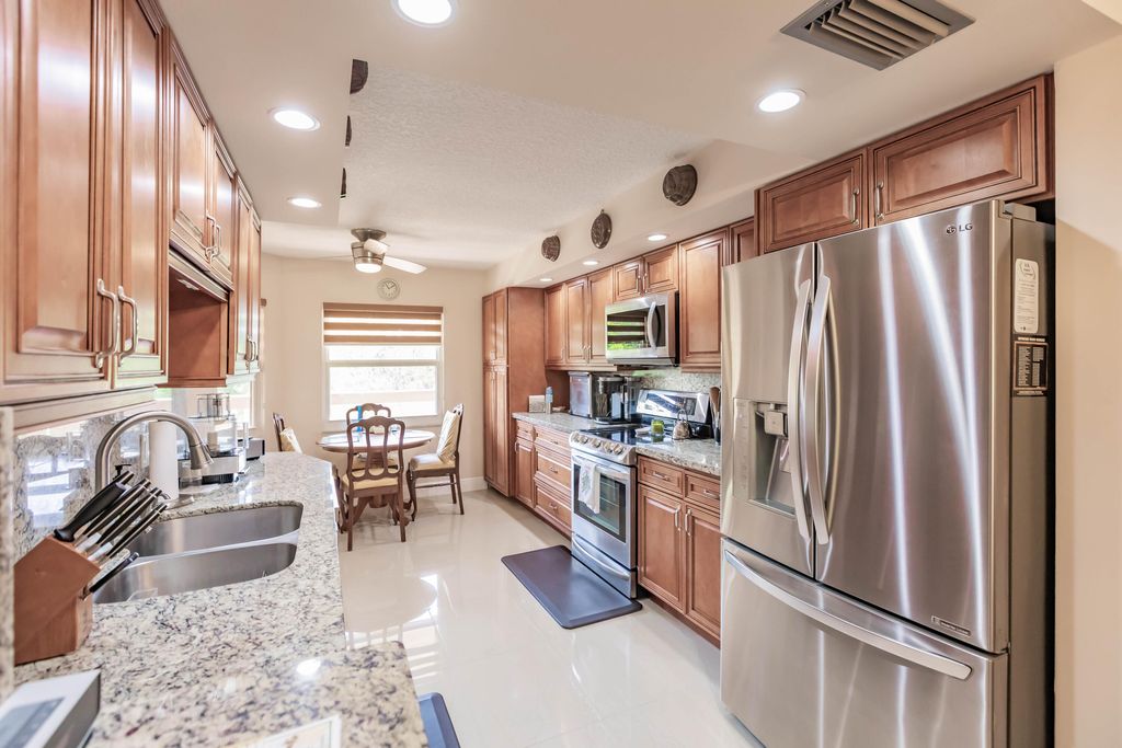 Photo of 1606 Abaco Drive #H4, Coconut Creek, FL 33066 (MLS # B26011573)